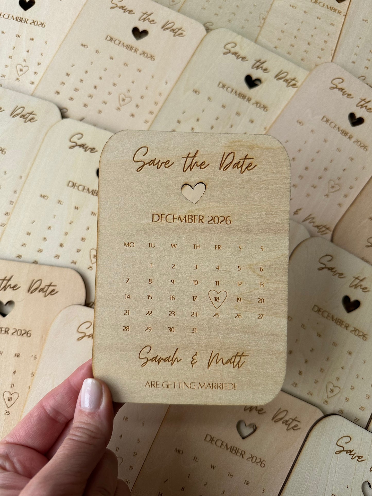 Wooden engraved save the date