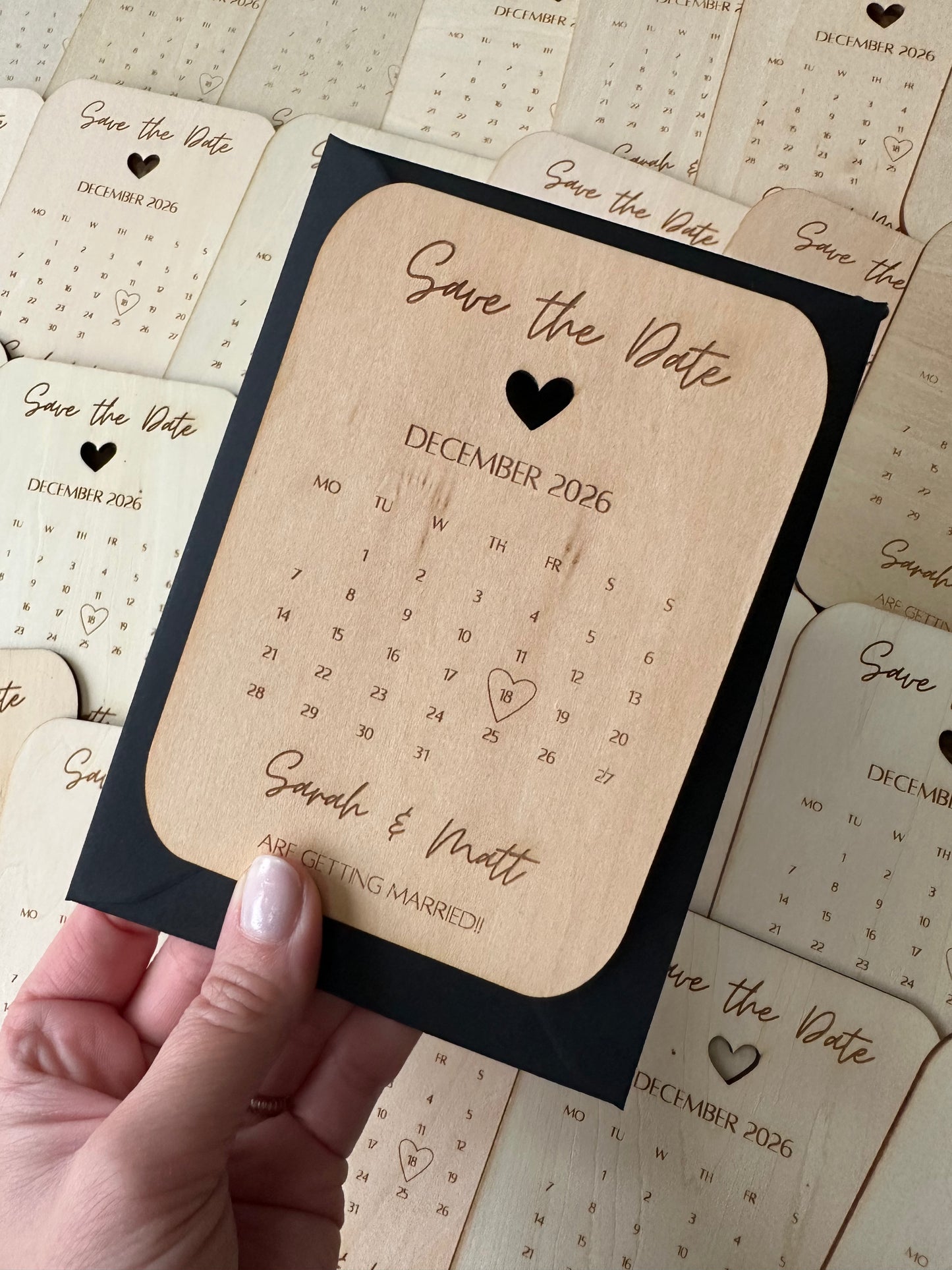 Wooden engraved save the date